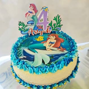 Enn cheesecake fet avek dekorasion mermaid